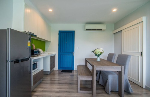 Hua Hin Condominio | Relájese en un condominio de lujo en la playa con acceso privado a la playa