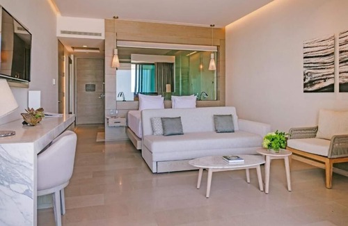 Punta Sam Hotel | Unwind in Style: Beachfront Resort w/ Tranquil Pools, Spa & Delicious Cuisine