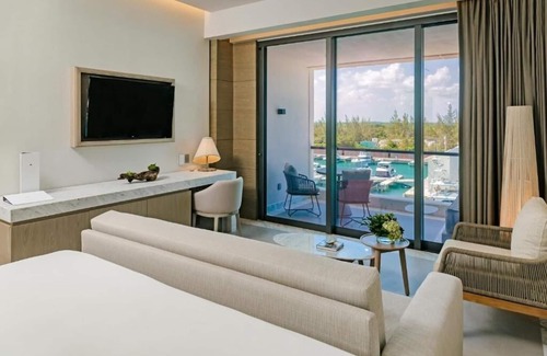 Punta Sam Hotel | Unwind in Style: Beachfront Resort w/ Tranquil Pools, Spa & Delicious Cuisine