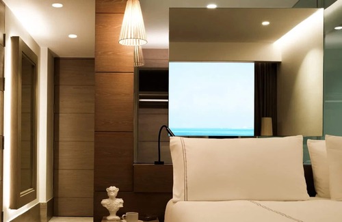 Punta Sam Hotel | Unwind in Style: Beachfront Resort w/ Tranquil Pools, Spa & Delicious Cuisine