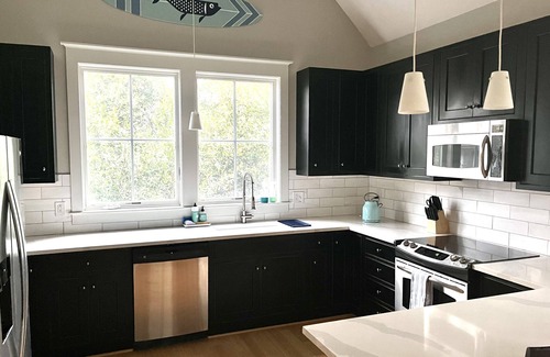 Cape Fear Station Casa | Updated 4 BR home in Cape Fear Station by East Beach with access to Shoals Club