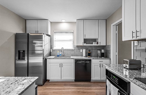 Southwest Carrollton Casa | Updated and centrally located home with attached garage.