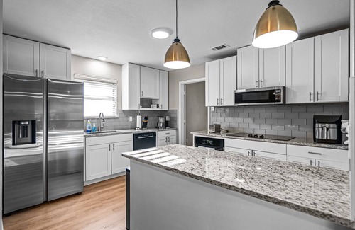 Southwest Carrollton Casa | Updated and centrally located home with attached garage.
