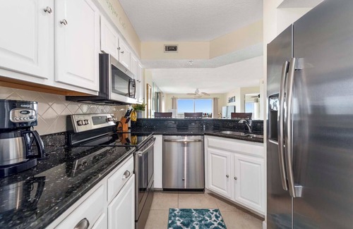 Seawinds Condo Condominio | Updated direct oceanfront corner with private balcony, beachfront pool and garage