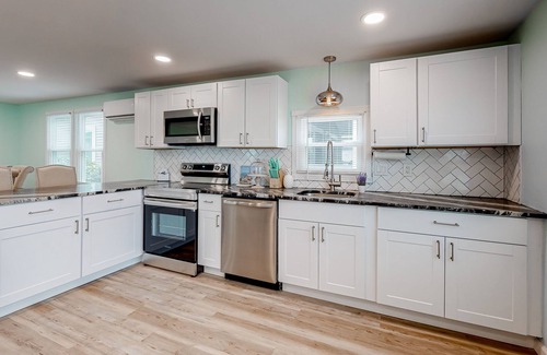 Montego Bay Casa | Updated dog-friendly home with gas grill, 2 pools, 2 tennis courts, fishing pier