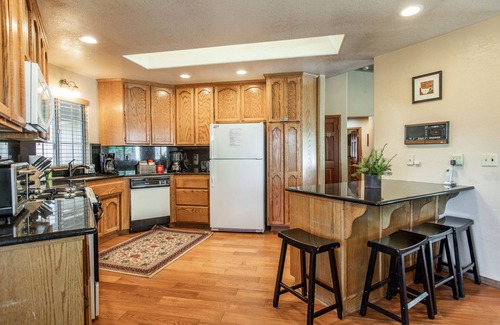 Upper Moonridge Casa | Updated home with spa, pool and ping-pong tables, king suite, bunk room + more!
