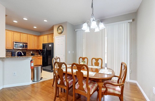Trafalgar Village Casa | Updated retreat with pool access, W/D, AC, & patio - close to Disney Parks