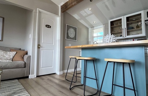 San Luis Obispo County Cabaña | Upscale Beach Cottage - rock view - paddleboards