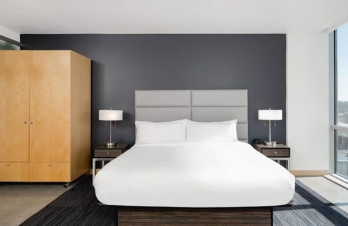 Iowa City Hotel | Upscale Downtown Suite – 2 Units w/ Kitchen, Walk to U of Iowa, Shops, Museum