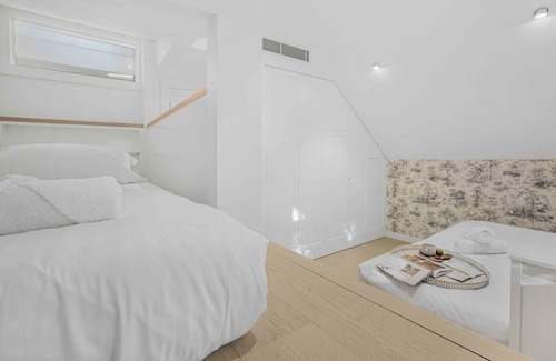 Newtown Casa | Urban oasis: Stylish 4BR retreat in vibrant Newtown