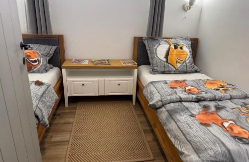 Komlo Apartamento | VándorLÓ Vendégház