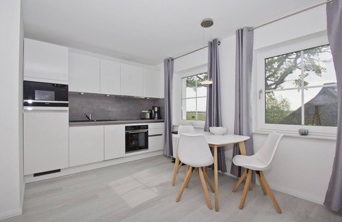 Gross Zicker Apartamento | Vacation apartment with sea view and garden use - Haus Inselwind FeWo MEERduft
