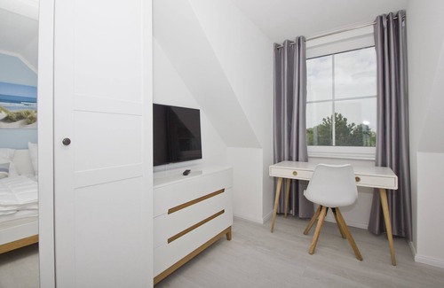 Gross Zicker Apartamento | Vacation apartment with sea view and garden use - Haus Inselwind FeWo MEERduft