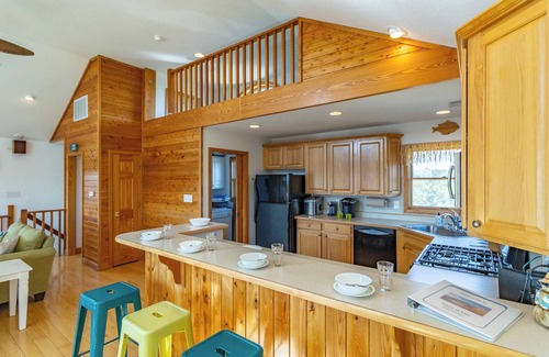 Carova Beach Casa | Vacation among the wild horses at this beautiful Carova beach house! 4x4 Require