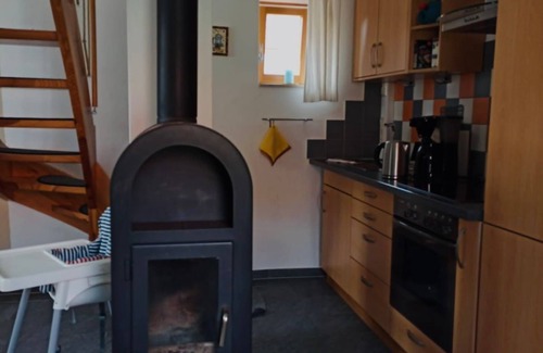 Neupetershain Nord Apartamento | Vacation apartment Schusterhaus - Ferienhof Welz