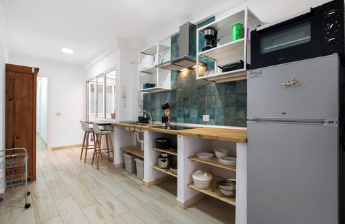 Playa de Arinaga Apartamento | Apartamento de vacaciones 'Beautiful Raidice House' con balcón, Wi-Fi y aire acondicionado