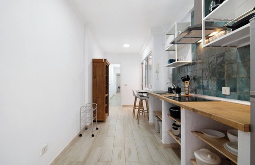 Playa de Arinaga Apartamento | Apartamento de vacaciones 'Beautiful Raidice House' con balcón, Wi-Fi y aire acondicionado