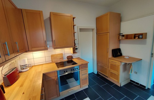 Emden Condominio | Vacation apartment Jantje in Emden city center with garden directly on the canal