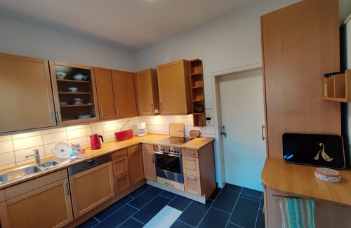 Emden Condominio | Vacation apartment Jantje in Emden city center with garden directly on the canal