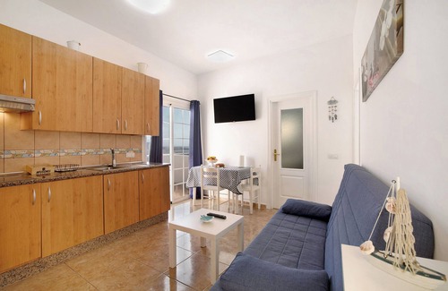 Las Arenas Apartamento | Casa de vacaciones "Atico Las Arenas" con vistas al mar, terraza privada y Wi-Fi