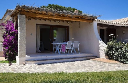 La Conia Casa | Casa de vacaciones "Casa giardino e spiaggia a piedi" cerca de la playa con jardín y terraza
