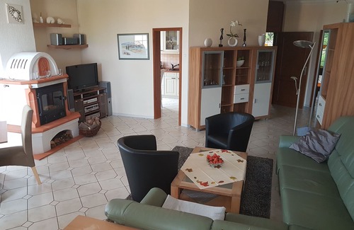 Ballenstedt Casa | Casa de vacaciones para 8 personas con piscina, chimenea, parque infantil, amplio jardín.