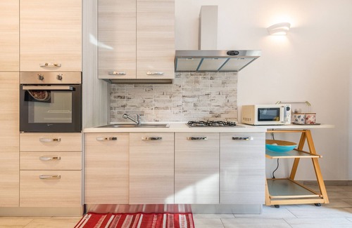 Geremeas Casa | Casa de vacaciones "Ibiscus Rosa 1" con vistas a la montaña, terraza y aire acondicionado