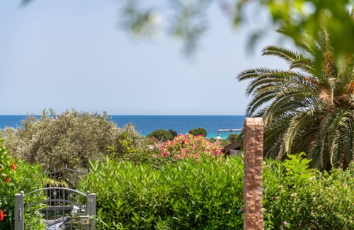 Costa Rei Casa | Casa de vacaciones 'La Casa di Silvia' con vistas al mar, jardín y terraza privada