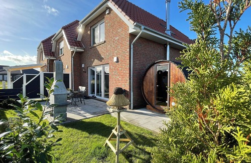 Wangerland Casa | Vacation home Meerwunder am Wangermeer - comfort with sauna and terrace