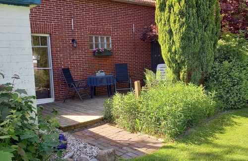 Buttforde Cabaña | Cottage en Frisia Oriental con terraza, el Mar del Norte, 2 pers. desde 29, - por día
