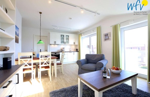 Wangerooge Apartamento | Vacation with a sunny balcony and your own beach chair on the beach