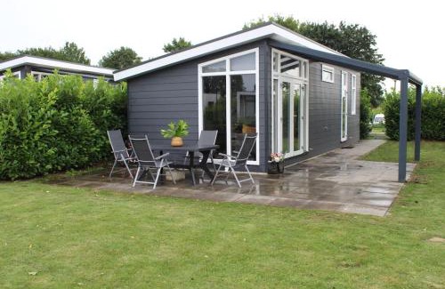 Lathum Chalet De Esquí | Vakantiehuis met vijverzicht
