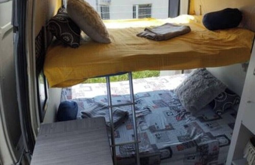 Millenaire Casa | Van set up in a PUBLIC parking lot that's good for repairs