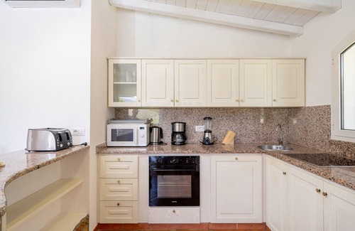 Torre delle Stelle Villa | Villa Corallia: Exclusiva villa con piscina y vistas sobre la bahía