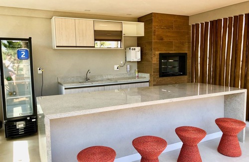 Itacimirim Apartamento | Vilage caminar en la arena con piscinas naturales cerca del condominio!