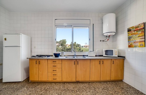 Palafolls Chalet De Esquí | Villa 20 pax con gran piscina privada, jardín y bbq. Cocina y comedor al aire libre. 10 dormitorios. Wifi gratis. Vivalidays Villa Genis.