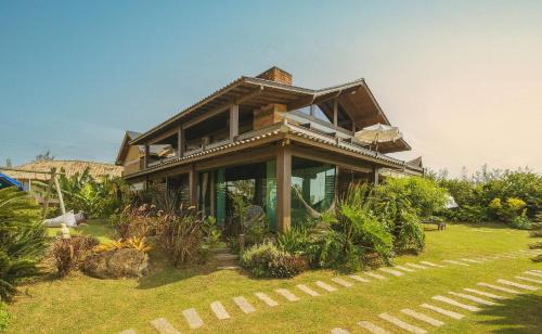 Barra de Ibiraquera Casa | Villa Bali Casas pé na areia