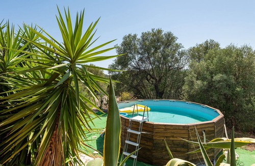 Sarroch Casa | Villa "Casa Vacanze Elena" con jardín, terraza y piscina