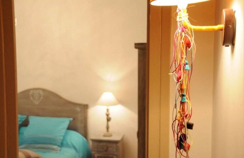 Vancia - Crepieux Casa | Pabellón Villa Castel Suite con sala de TV y cocina.