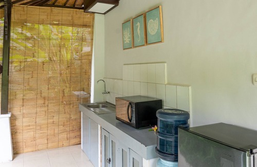 Seminyak Casa | Villa Coco - Bungalow de 1 dormitorio con jardín
