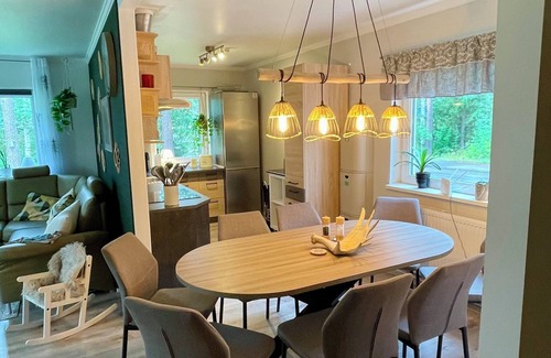 Vidsel Casa | Villa Davvi dállu: Family-friendly vacation home with playhouse, sauna & garden