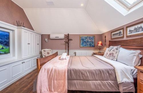 Gramado City Centre Apartamento | Villa Di Pietro 502 - Apto no coração de Gramado 400 metros Rua Coberta