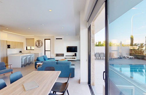Cape Greko Villa | Villa Ektoras at Periyiali Resort with modern design, and amenities.
