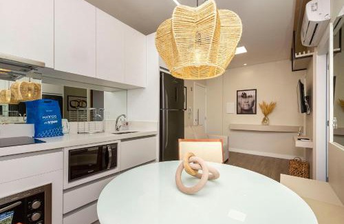 Bombas Apartamento | Villa Francione 406 – Loft de Alto Padrão com Piscina no Rooftop e Vista Panorâmica, a Poucos Metros do Mar em Bombas.