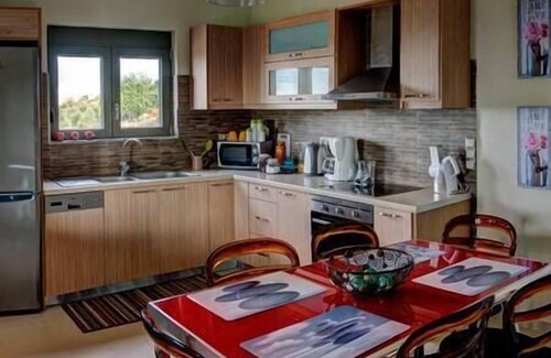Skouloufia Villa | New, Modern Villa with Sea Views