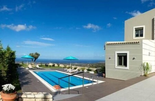 Skouloufia Villa | New, Modern Villa with Sea Views