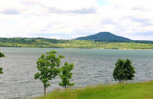 Deutsch Ossig Apartamento | Villa Ilex - Ein Massivholzhaus direkt am See