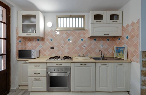 Capo Mannu Apartamento | "Villa Agostina Antonio" con jardín compartido y Wi-Fi