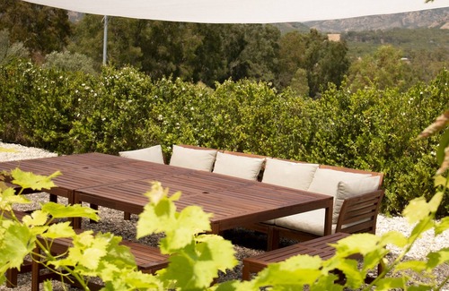 Cala Liberotto Villa | Villa exclusiva con piscina privada y vistas al mar.