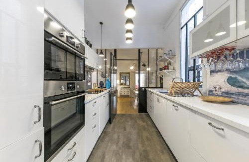 Ecusson Apartamento | Villa jeu de paume - Première conciergerie